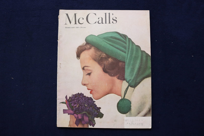 1949 FEB MCCALL'S MAGAZINE - BEAUTIFUL WOMAN SMELLING FLOWERS COVER - E 22129