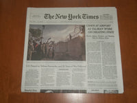 2021 AUGUST 23 NEW YORK TIMES-CHAOS AT AIRPORT AS TALIBAN WORK ON CREATING STATE