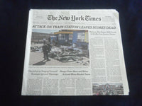 2022 APRIL 9 NEW YORK TIMES - ATTACK ON TRAIN STATION LEAVES SCORES DEAD