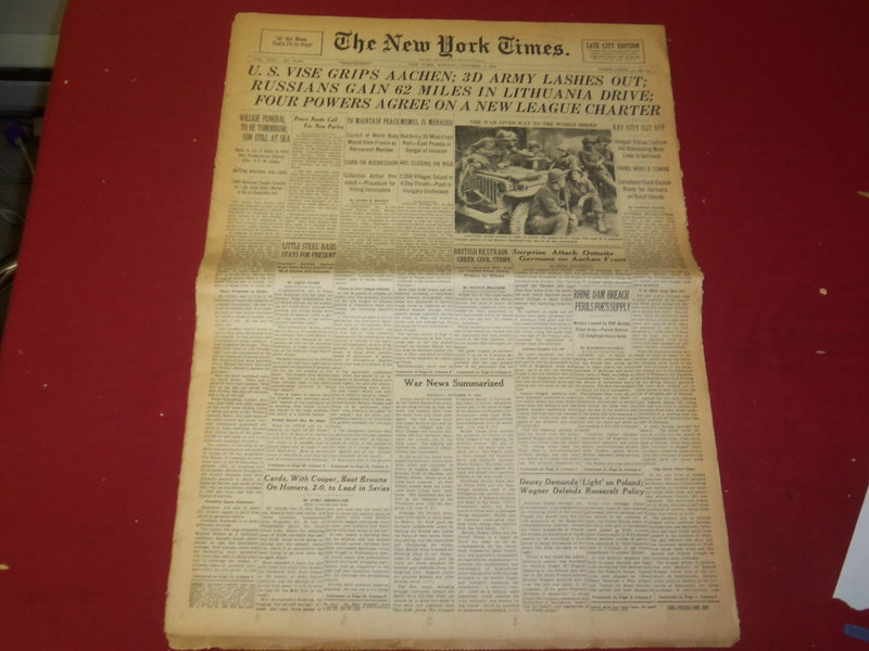 1944 OCTOBER 9 NEW YORK TIMES - U.S. VISE GRIPS AACHEN; 3D ARMY LASHES - NP 3810
