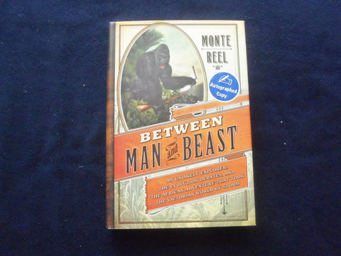 2013 BETWEEN MAN AND BEAST HARDCOVER BOOK - AUTOGRAPHED BY MONTE REEL - KD 8526