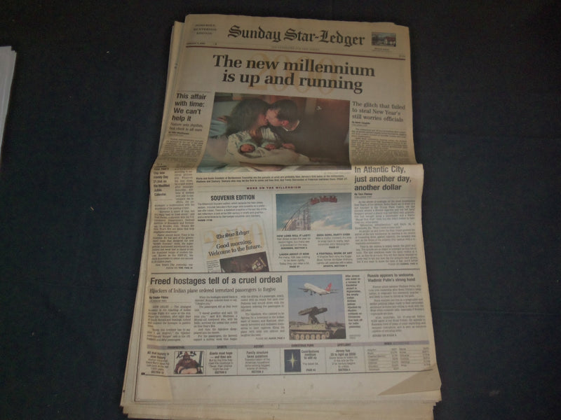 2000 JANUARY 2 SUNDAY STAR-LEDGER NEWSPAPER - THE NEW MILLENNIUM IS UP - NP 3470