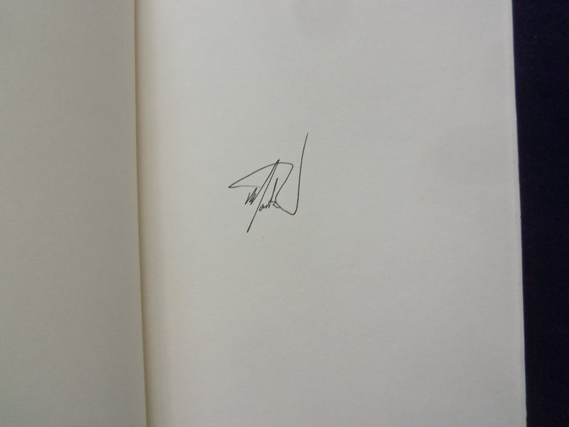 2013 BETWEEN MAN AND BEAST HARDCOVER BOOK - AUTOGRAPHED BY MONTE REEL - KD 8526