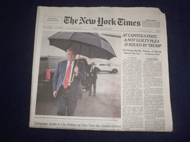 2023 AUG 4 NEW YORK TIMES-AT CAPITOL'S FOOT A NOT GUILTY PLEA IS ISSUED BY TRUMP