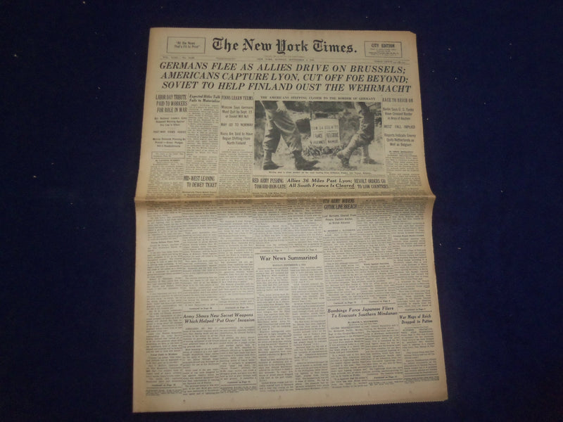 1944 SEP 4 NEW YORK TIMES - GERMANS FLEE AS ALLIES DRIVE ON BRUSSELS - NP 6613
