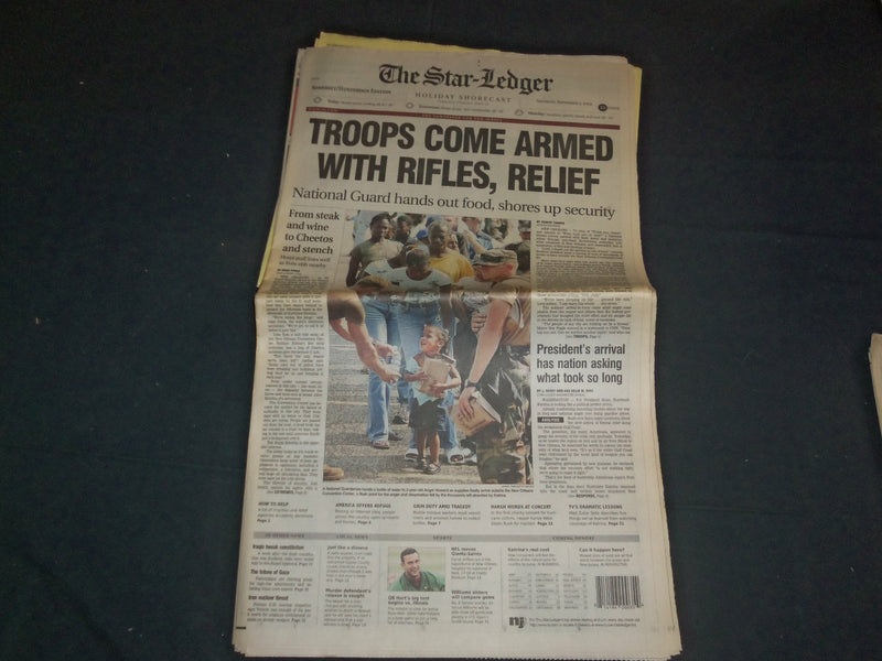 2005 SEPTEMBER 3 THE STAR-LEDGER NEWSPAPER - TROOPS COME ARMED W/RIFLES- NP 3489