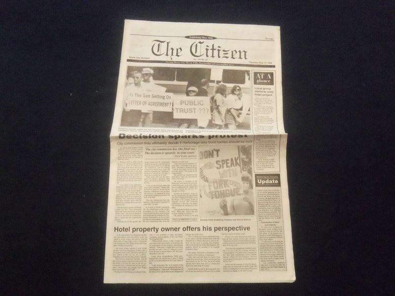 1995 AUG 15 THE CITIZEN NEWSPAPER-BOYNE CITY,MI -DECISION SPARKS PROTEST-NP 6097