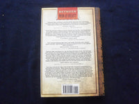2013 BETWEEN MAN AND BEAST HARDCOVER BOOK - AUTOGRAPHED BY MONTE REEL - KD 8526