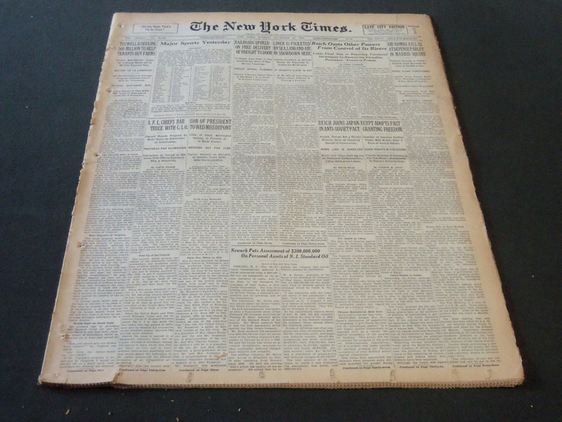 1936 NOVEMBER 15 NEW YORK TIMES - AIR BOMBS KILL 53 IN MADRID SQUARE - NT 6713