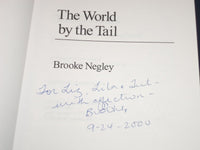 1999 THE WORLD BY THE TAIL BOOK BY BROOKE NEGLEY AUTHOR INSCRIBED - KD 2571