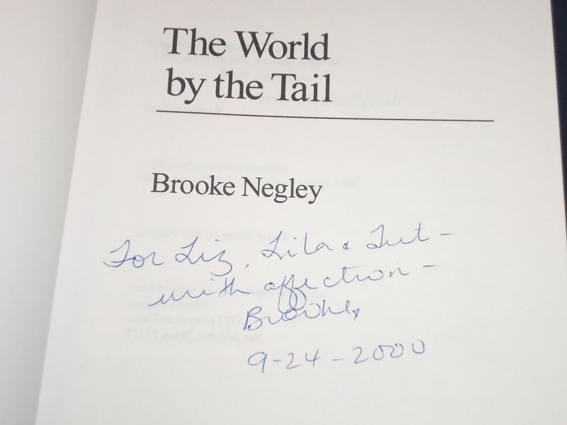 1999 THE WORLD BY THE TAIL BOOK BY BROOKE NEGLEY AUTHOR INSCRIBED - KD 2571