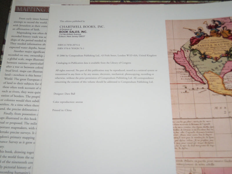 2006 MAPPING THE WORLD HARDCOVER BOOK BY MICHAEL SWIFT - I 1733