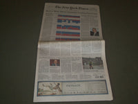 2012 NOVEMBER 8 NEW YORK TIMES NEWSPAPER - OBAMA GREETED BY LOOMING - NP 2723