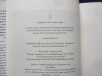 2013 BETWEEN MAN AND BEAST HARDCOVER BOOK - AUTOGRAPHED BY MONTE REEL - KD 8526