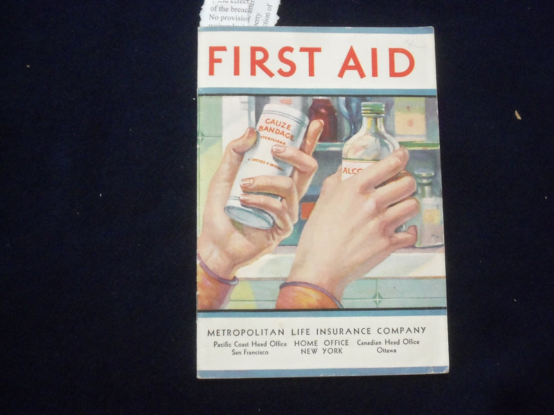 1930'S FIRST AID SOFTCOVER BOOK - METROPOLITAN LIFE INSURANCE COMPANY - J 9629